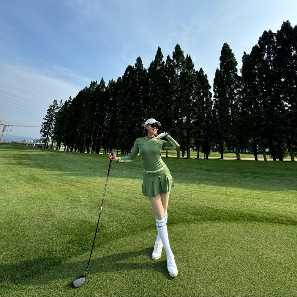 Golf set (top & Skirt) teranium green with midgreen and white modern batik underarm breathable material panels & vertical pleated / frilled crewneck and pleated / frilled long sleeve cuffs