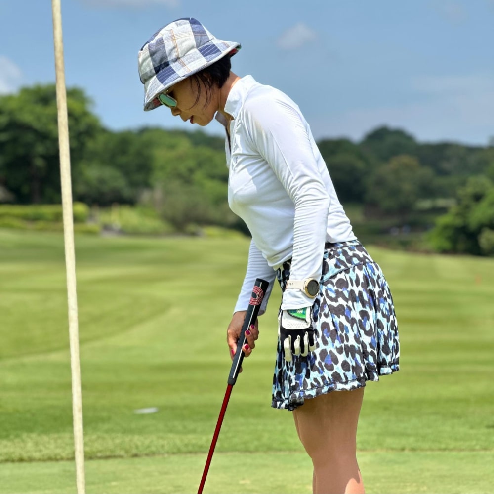 Skirt blue and black leopard motif and off white with 2 stright cut front pocket and all around swing pleats